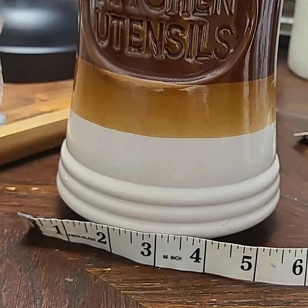 Vintage kitchen utensils holder.